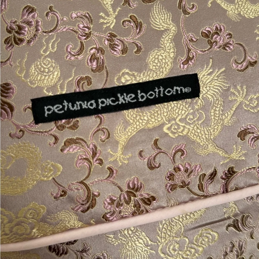 Petunia Pickle Bottom Pink and Gold Baby Bag sushi roll color